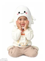 Smiling toddler in cute baby ghost headgear with hands on cheeks